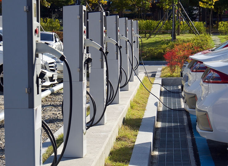 row of electric vehicle charging stations