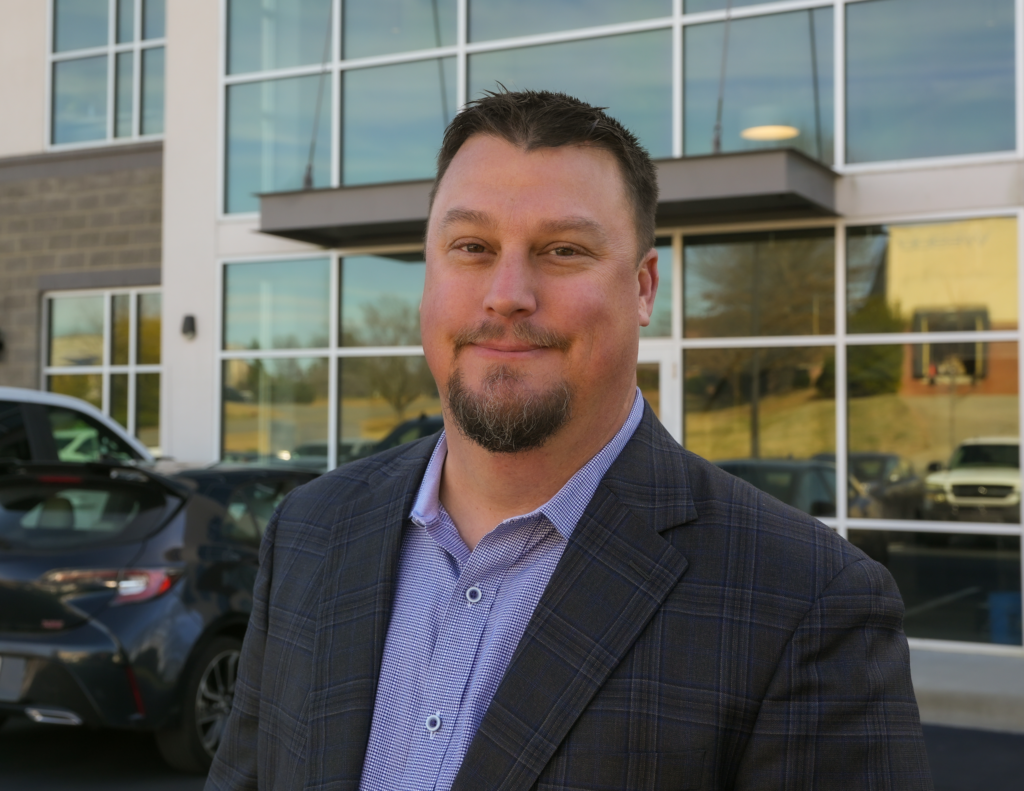 Headshot of Justin Taylor, Co-Founder of Koulomb